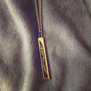 Gold tone “easy to love” bar necklace